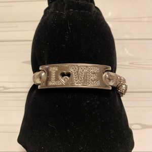 Brighton “love is all you need” bracelet with 4 charms